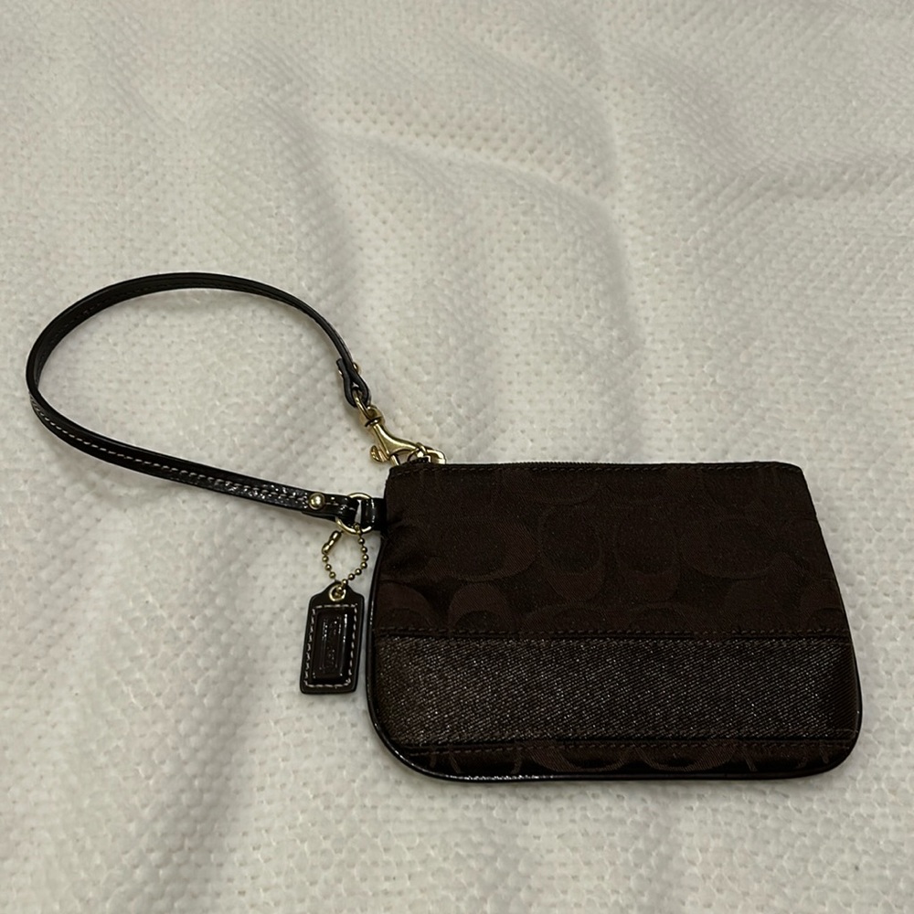 Chocolate brown Coach wristlet
